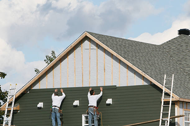 Professional Storm Damage Siding Repair technician working in Halifax, VA